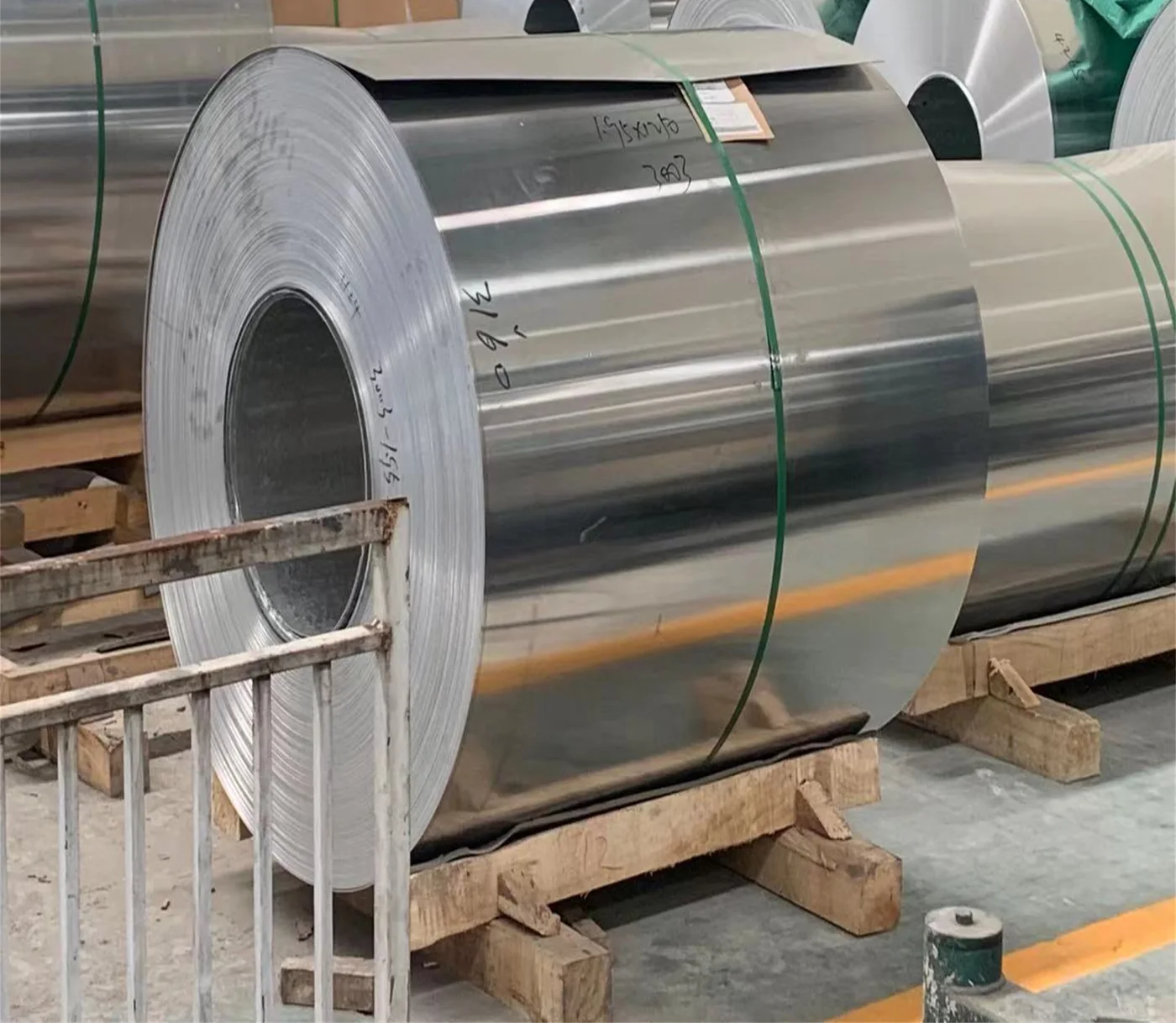Aluminium coil held in covered storage before loading